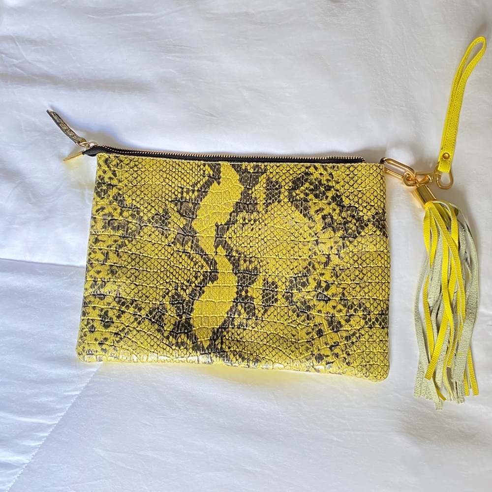 Yellow snakeskin clutch/wristlet.